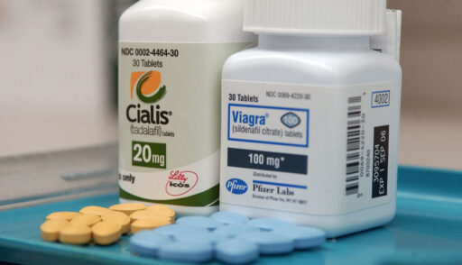 Viagra and Cialis tablets are pictured on a tray at a pharmacy. (Photo by Daniel Acker/Bloomberg via Getty Images)